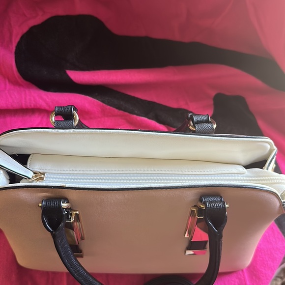 Tote style purse never used. Purse still has its original shape. - Picture 6 of 6